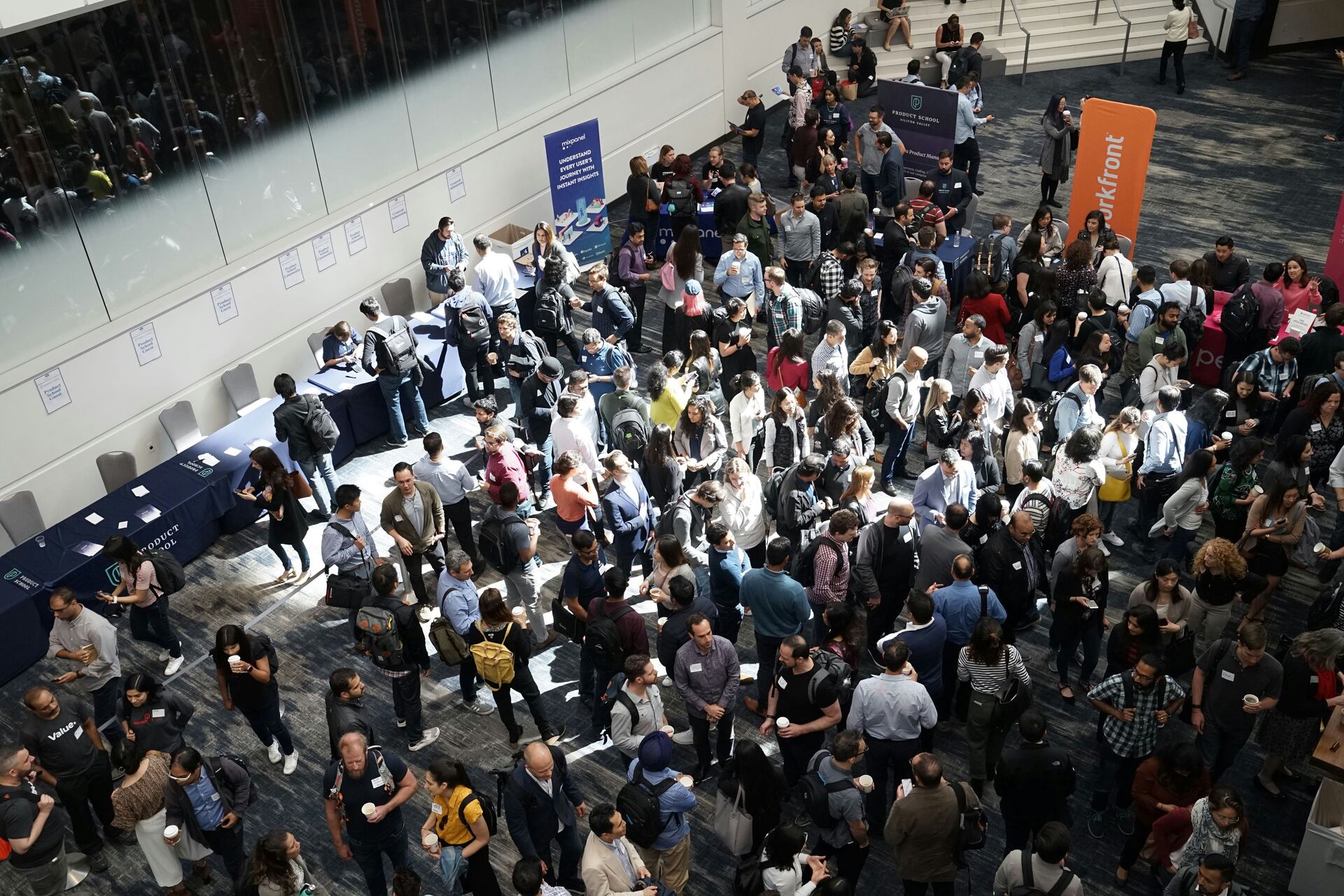 Researchers networking at an international academic conference